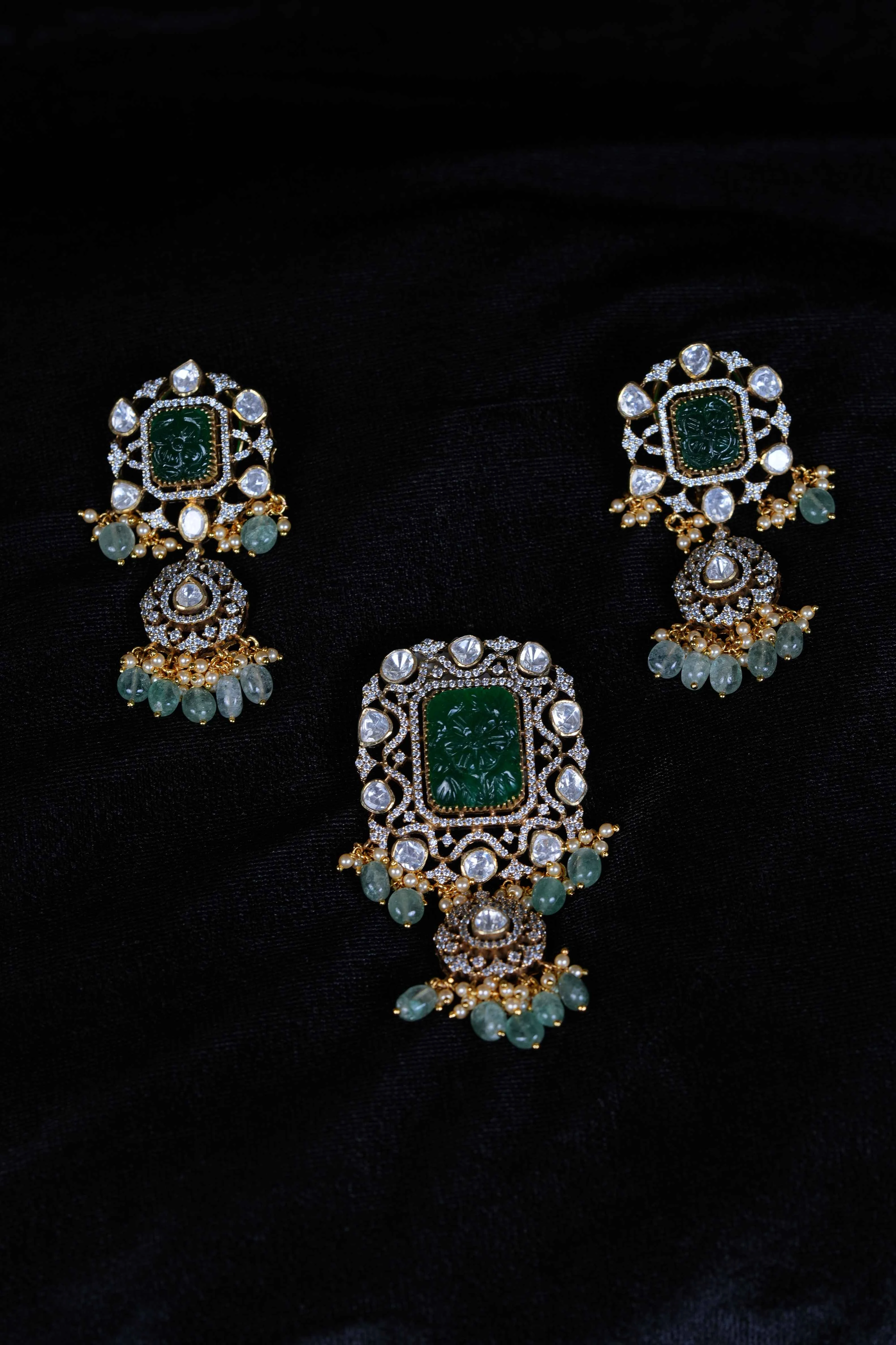carved emarald pendant set